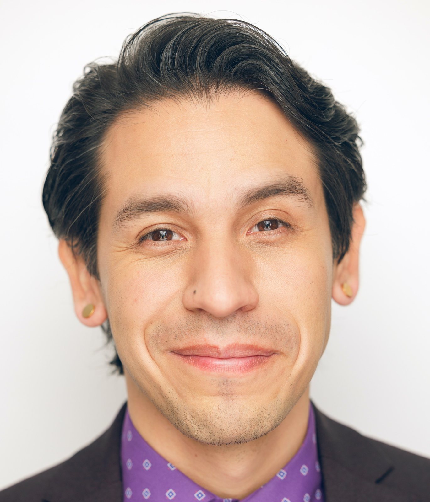 Portrait, dark jacket and purple shirt